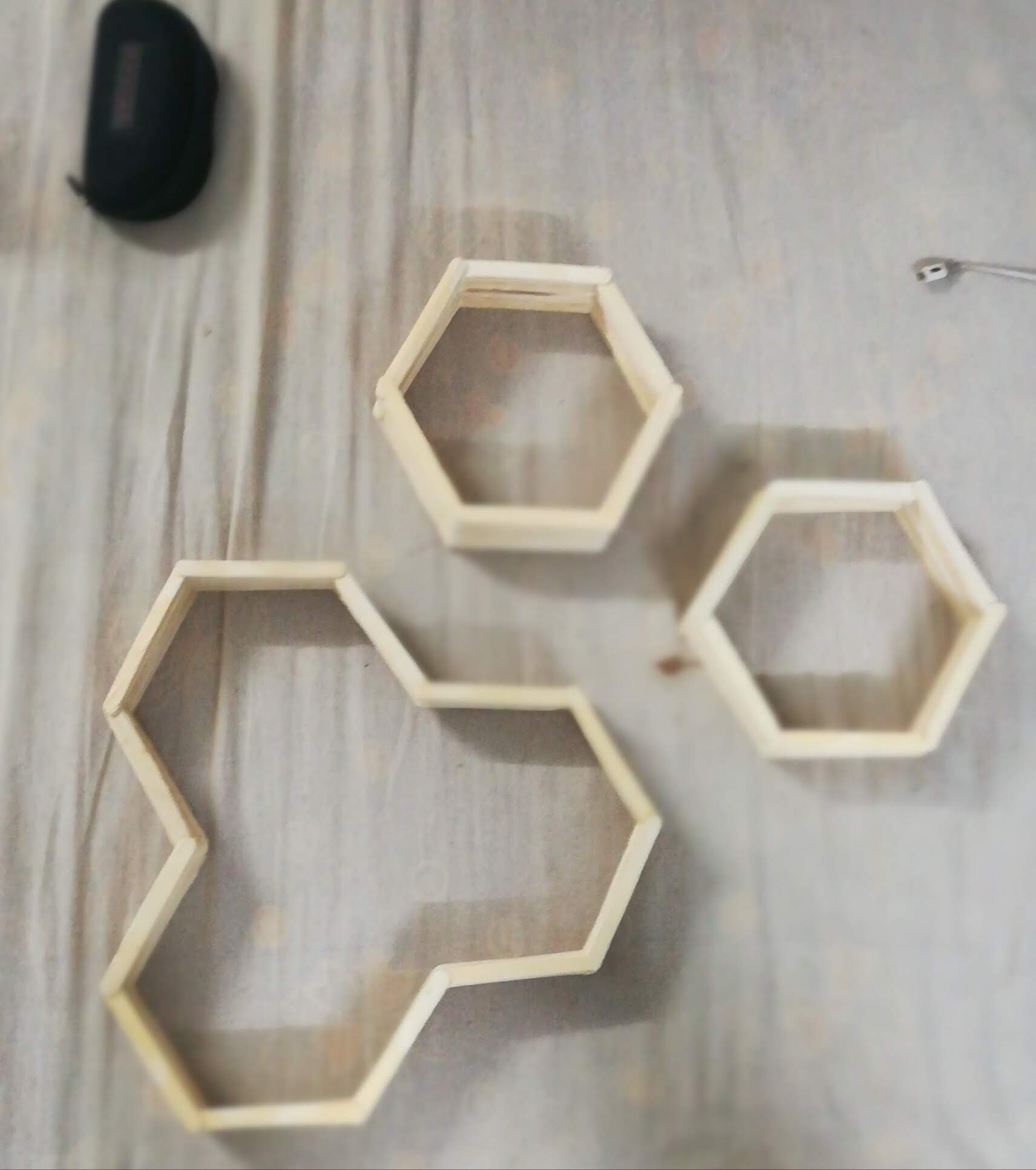 Hexagonal wood sticks wall art 